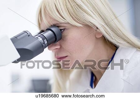 Female laboratory technician using microscope in the lab. View Large Photo Image Stock Image - Female laboratory technician using microscope in the lab.. Fotosearch