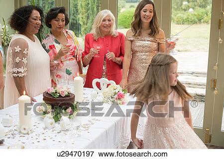 Female wedding guests at reception View Large Photo Image Stock Photo - Female wedding guests at reception. Fotosearch