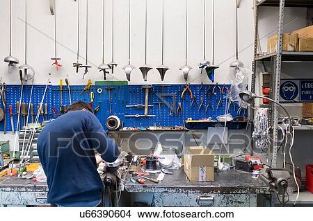 Picture - Fencing prop maker at work. Fotosearch
