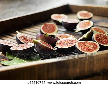 Picture - Figs on dryer. Fotosearch