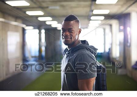 Stock Photography - Fit man in gym. Fotosearch