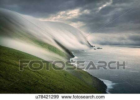 Stock Photo - Floating sea fog, Blasket Islands, Great Blasket, Ireland. Fotosearch
