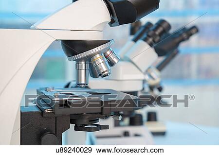 Four microscopes of different designs. View Large Photo Image Stock Photo - Four microscopes of different designs.. Fotosearch