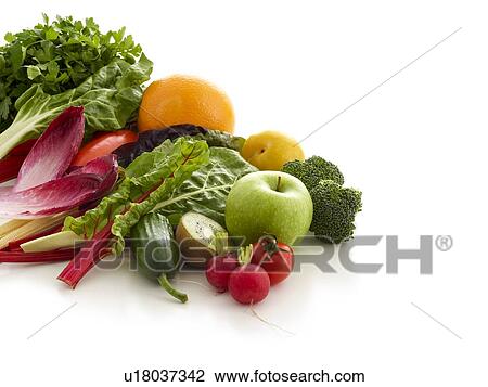 Stock Image - Fresh fruit and vegetables, studio shot.. Fotosearch