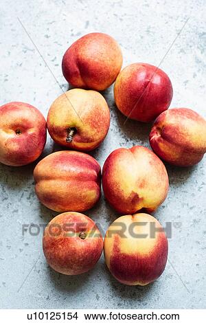 Fresh peaches on table View Large Photo Image Picture - Fresh peaches on table. Fotosearch