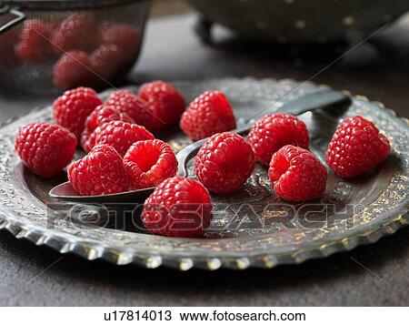 Stock Image - Fresh raspberries. Fotosearch