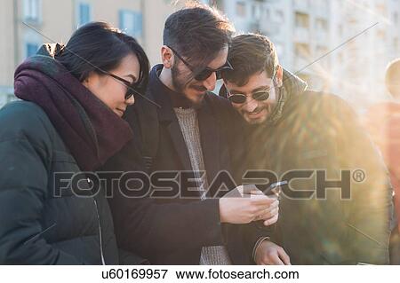 Friends on city break, Milan, Italy View Large Photo Image Stock Photo - Friends on city break, Milan, Italy. Fotosearch