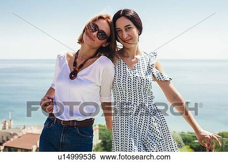 Friends on seaside terrace, Odessa, Ukraine View Large Photo Image Stock Photograph - Friends on seaside terrace, Odessa, Ukraine. Fotosearch