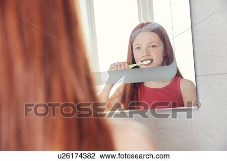 Girl brushing teeth View Large Photo Image Stock Image - Girl brushing teeth. Fotosearch