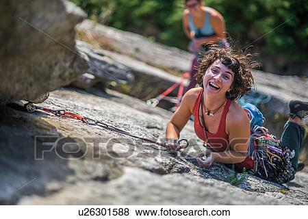 Stock Photo - Girlfriends rock climbing, Malamute, Squamish, Canada. Fotosearch