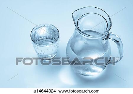 Picture - Glass and jug of water.. Fotosearch
