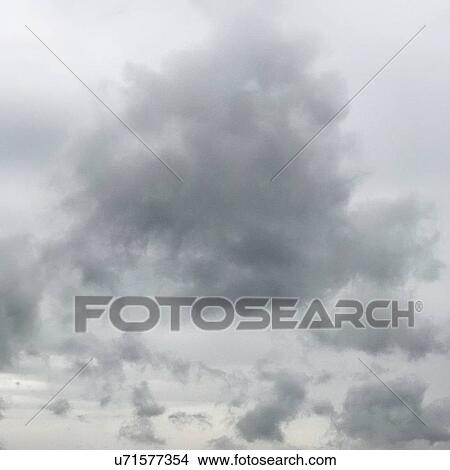 Picture - Grey clouds in sky. Fotosearch
