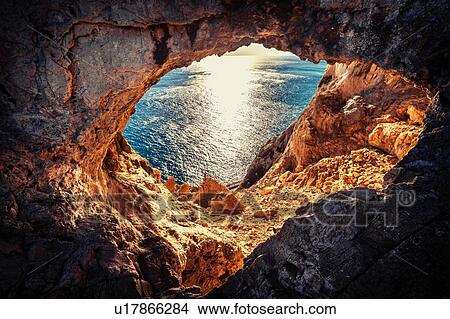 Picture - Grotta dei Briganti (Robber's Cave), Varigotti, Liguria, Italy. Fotosearch