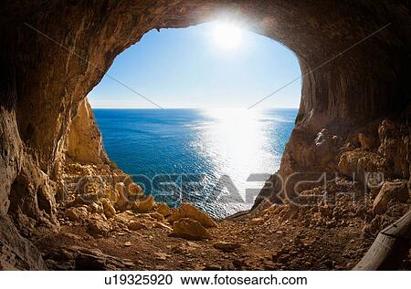 Stock Image - Grotta dei Briganti (Robber's Cave), Varigotti, Liguria, Italy. Fotosearch
