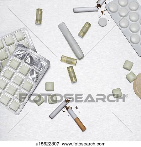 Stock Photo - Gum and pills to help stop smoking.. Fotosearch