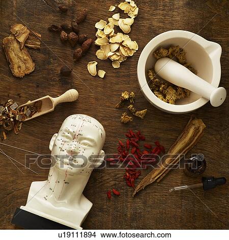 Picture - Herbs and equipment used for alternative medicine.. Fotosearch