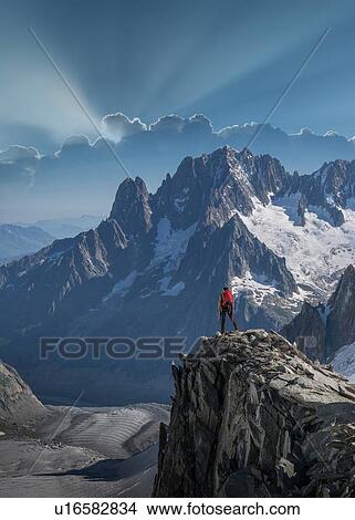 Picture - Hiker enjoying scenery, Chamonix-Mont-Blanc, Rhone-Alpes, France. Fotosearch