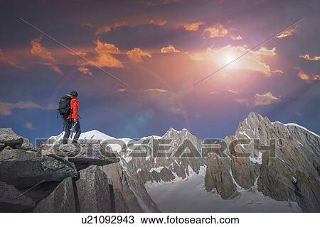 Hiker enjoying scenery, Chamonix-Mont-Blanc, Rhone-Alpes, France View Large Photo Image Stock Image - Hiker enjoying scenery, Chamonix-Mont-Blanc, Rhone-Alpes, France. Fotosearch