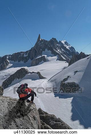Hiker enjoying scenery, Chamonix-Mont-Blanc, Rhone-Alpes, France View Large Photo Image Stock Photography - Hiker enjoying scenery, Chamonix-Mont-Blanc, Rhone-Alpes, France. Fotosearch