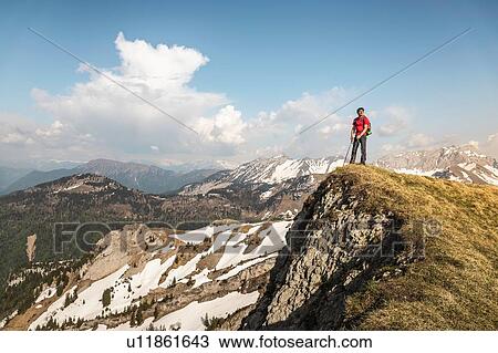 Hiker trekking French Alps, Parc naturel rgional du Massif des Bauges, Chatelard-en-Bauges, Rhone-Alpes, France View Large Photo Image Stock Image - Hiker trekking French Alps, Parc naturel rgional du Massif des Bauges, Chatelard-en-Bauges, Rhone-Alpes, France. Fotosearch