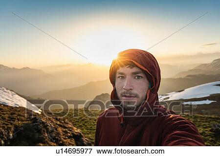 Stock Photo - Hiker trekking French Alps, Parc naturel rgional du Massif des Bauges, Chatelard-en-Bauges, Rhone-Alpes, France. Fotosearch