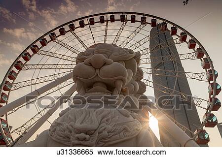 Stock Photography - Hong Kong Observation Wheel, Central and Wan Chai Reclamation, overlooking Victoria Harbour, Hong Kong. Fotosearch