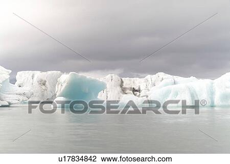 Iceberg in Jokulsarlon glacial lake, Iceland. View Large Photo Image Stock Image - Iceberg in Jokulsarlon glacial lake, Iceland.. Fotosearch