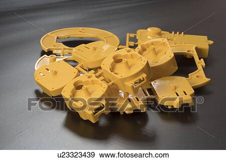 Stock Photo - Injection moulded plastic parts.. Fotosearch