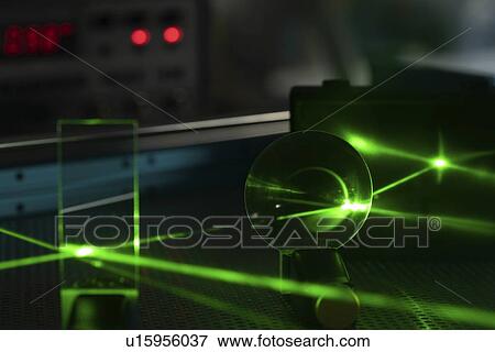 Stock Photo - Laser experiment in photonics laboratory.. Fotosearch