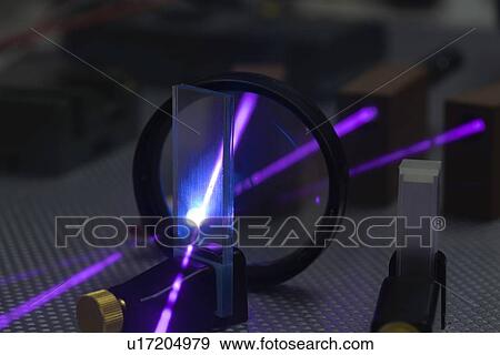 Stock Photo - Laser experiment in photonics laboratory.. Fotosearch