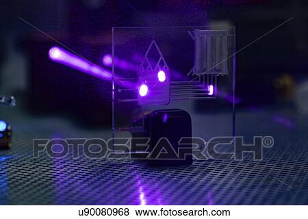 Stock Photo - Laser experiment in photonics laboratory.. Fotosearch