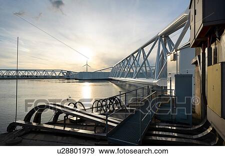 Maeslantkering storm surge barrier, Port of Rotterdam, Hoek van Holland, Zuid-Holland, Netherlands View Large Photo Image Stock Photo - Maeslantkering storm surge barrier, Port of Rotterdam, Hoek van Holland, Zuid-Holland, Netherlands. Fotosearch