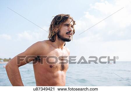 Stock Image - Man at seaside. Fotosearch