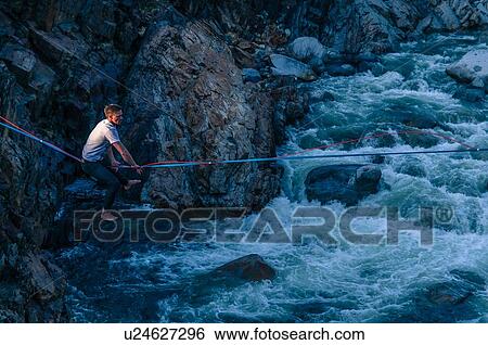 Man highlining above river, Truckee, California, USA View Large Photo Image Stock Photograph - Man highlining above river, Truckee, California, USA. Fotosearch