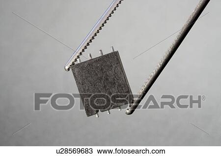 Stock Image - Micro-chip quantum processor, conceptual image.. Fotosearch