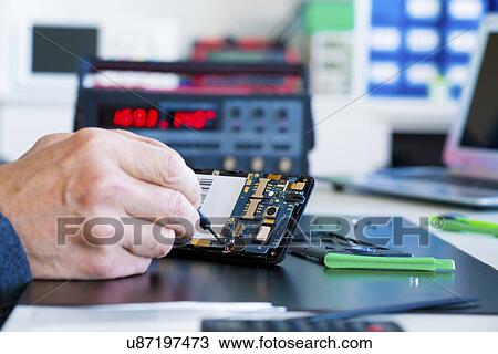 Mobile phone repair. View Large Photo Image Stock Image - Mobile phone repair.. Fotosearch
