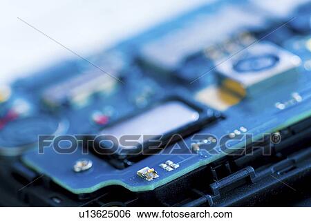 Stock Photograph - Mobile phone repair.. Fotosearch