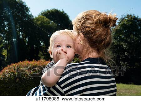 Mother with toddler in park View Large Photo Image Stock Photography - Mother with toddler in park. Fotosearch