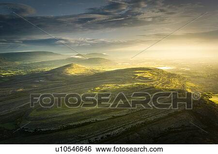 Stock Photograph - Mullaghmore Burren at sunrise, Fanore, Clare, Ireland. Fotosearch