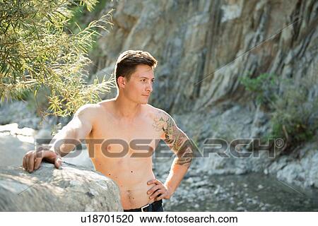 Muscular man by stream, Arezzo, Toscana, Italy View Large Photo Image Stock Image - Muscular man by stream, Arezzo, Toscana, Italy. Fotosearch