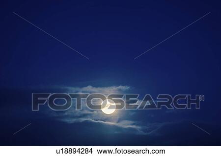 Night sky with moon and clouds. View Large Photo Image Picture - Night sky with moon and clouds.. Fotosearch