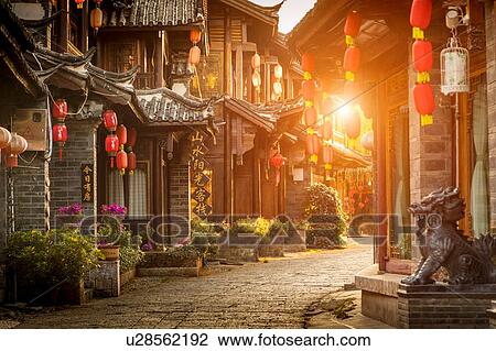 Stock Image - Old town of Lijiang at sunrise, Yunnan, China. Fotosearch