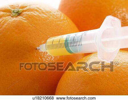Oranges with syringe. View Large Photo Image Stock Photo - Oranges with syringe.. Fotosearch