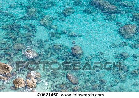 Stock Image - Overhead view of sea, Piscinas, Sardinia, Italy. Fotosearch