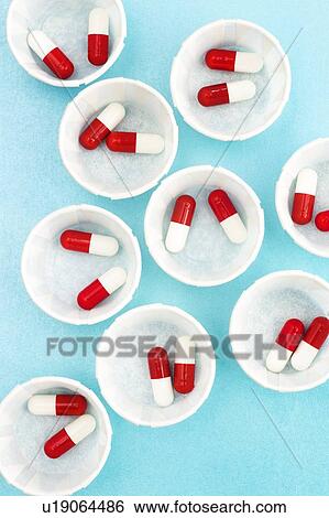 Paper medicine pots with red and white drug capsules. View Large Photo Image Stock Photograph - Paper medicine pots with red and white drug capsules.. Fotosearch