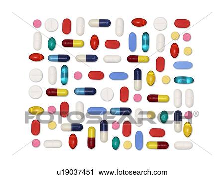 Stock Image - Pills and capsules against a white background.. Fotosearch