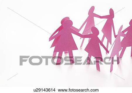 Pink cut out paper chain female figures against a white background. View Large Photo Image Picture - Pink cut out paper chain female figures against a white background.. Fotosearch