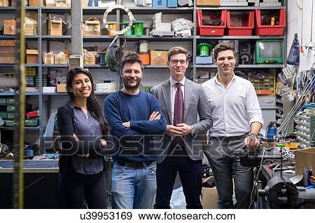 Portrait of colleagues in warehouse View Large Photo Image Stock Photo - Portrait of colleagues in warehouse. Fotosearch