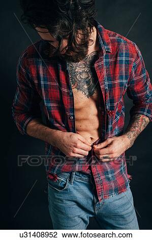 Portrait of hipster in checked shirt View Large Photo Image Stock Image - Portrait of hipster in checked shirt. Fotosearch