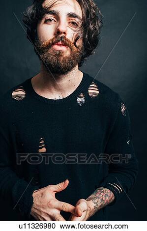 Portrait of hipster in torn top View Large Photo Image Stock Image - Portrait of hipster in torn top. Fotosearch